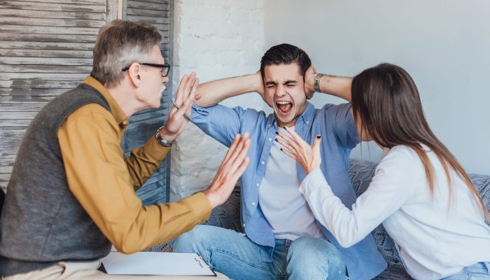 Young  angry couple after therapy session with family psychologist !