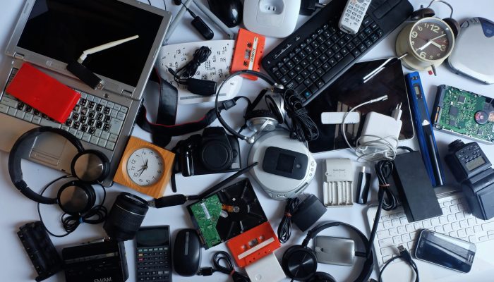 Pile of used Electronic Waste on white background, Reuse and Rec