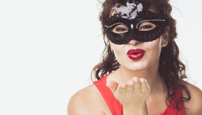 adult-woman-mask-sending-air-kiss