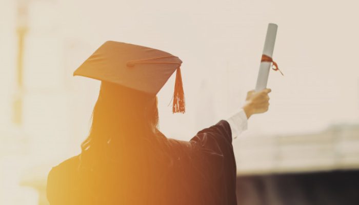 back-graduates-wear-cap-university_39131-124