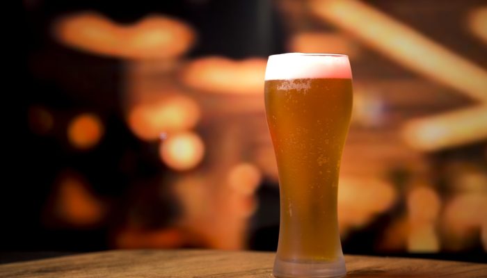 beer-glass-in-front-of-blurred-background