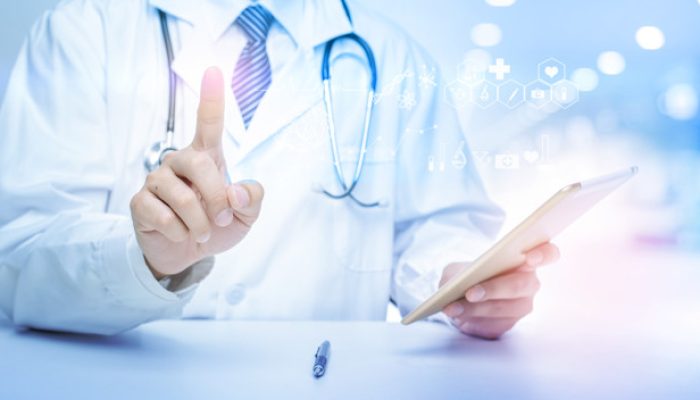 Close up of Doctor is showing medical analytics data, Medical technology concept
