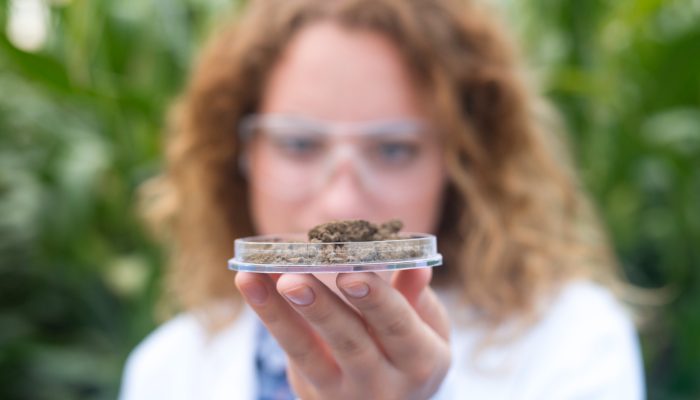 female-agronomist-specialist-examining-soil-sample-agriculture