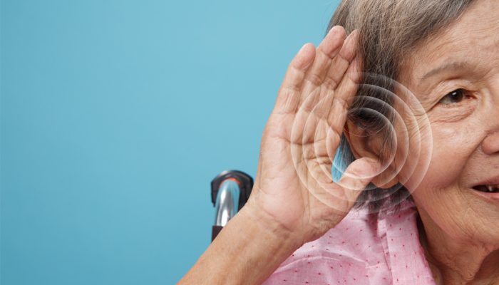 front-view-old-woman-experiencing-hearing-issues