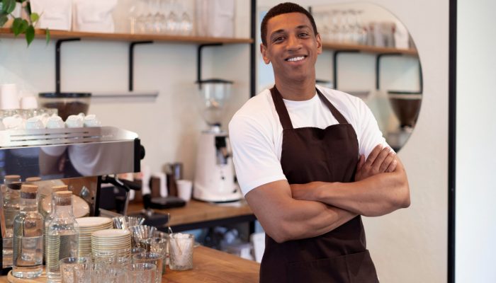 medium-shot-smiley-man-with-apron