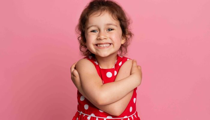 smiley-little-girl-red-dress