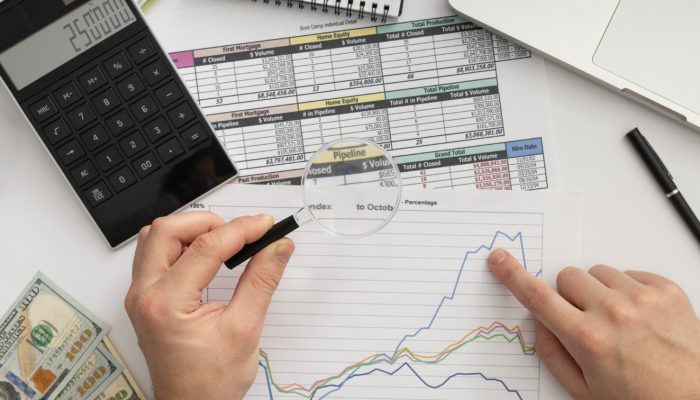 top-view-business-man-studying-graph